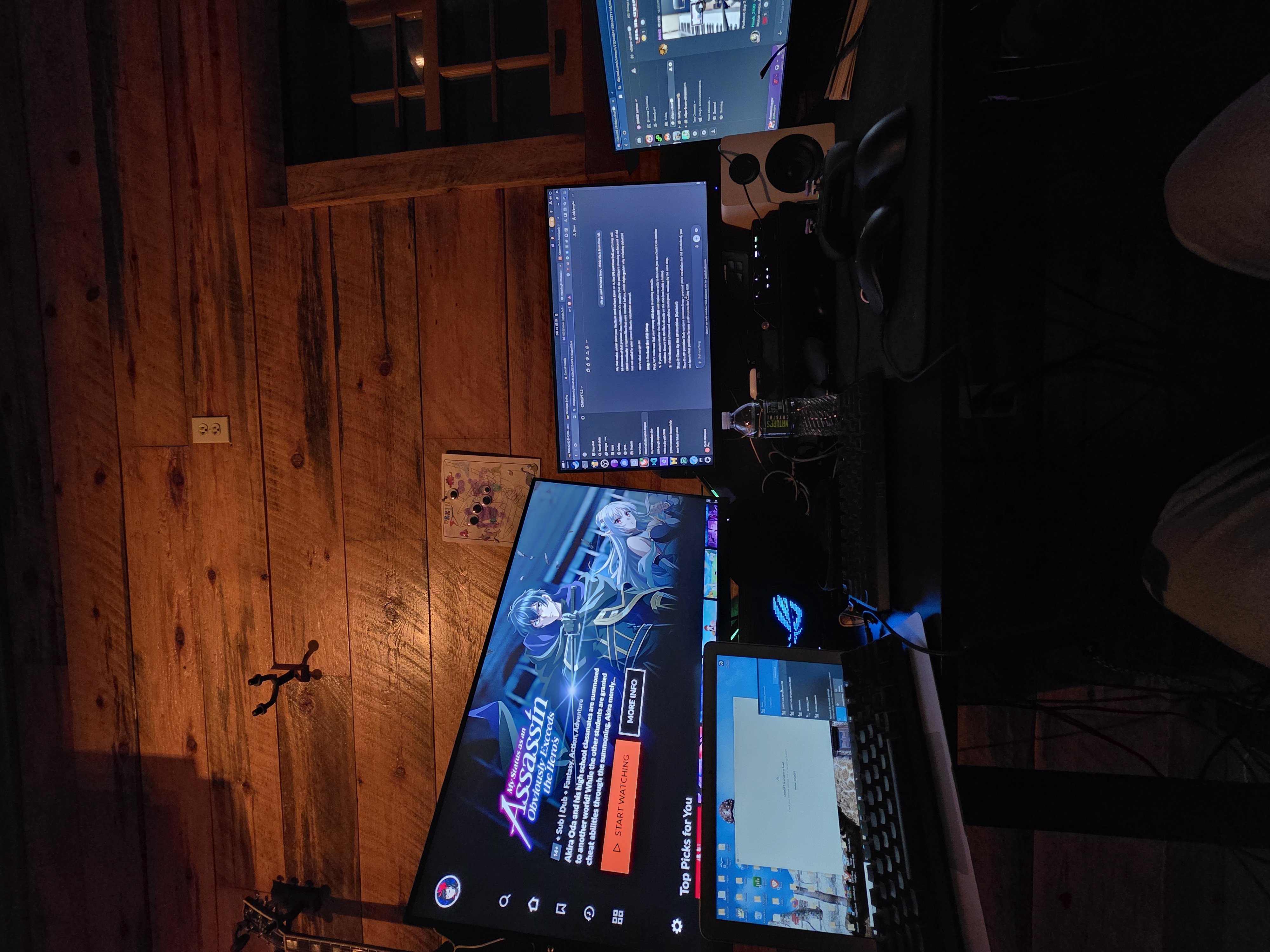The Sovereign Node - multi-monitor command center setup in the pine cabin